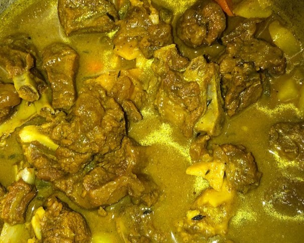 Cooked curry goat 1 - featured