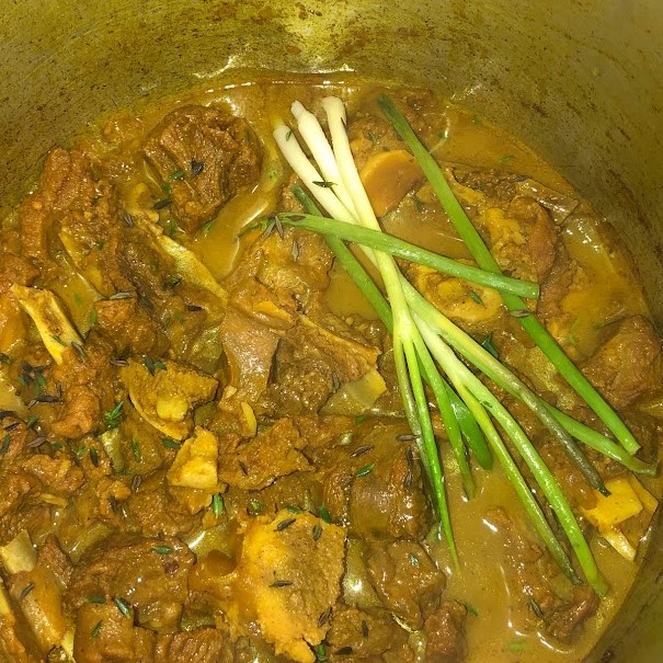 Seasoning curry goat