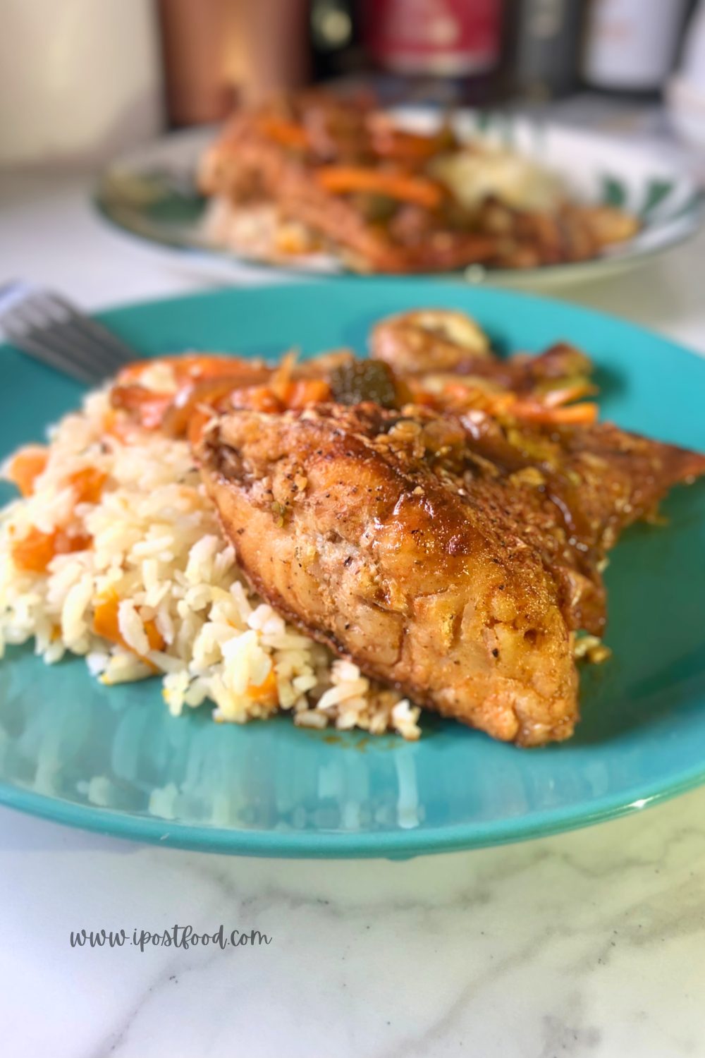 Jamaican Brown Stew Fish Dinner with pumpkin rice